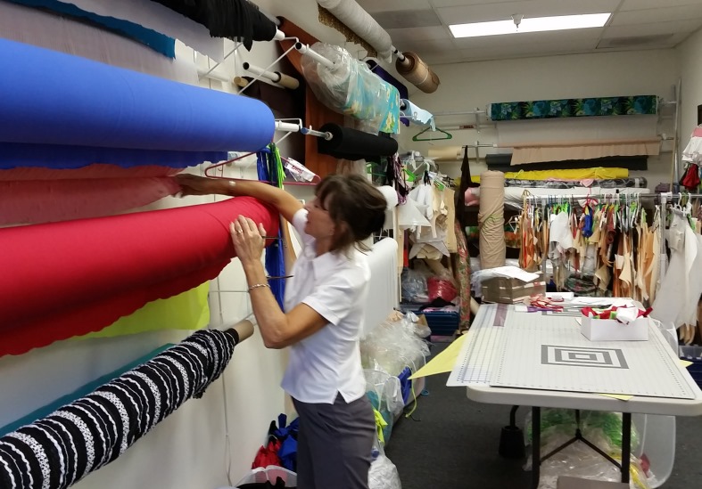 brigite selecting fabric for new swimwear at brigitewear's california production facility